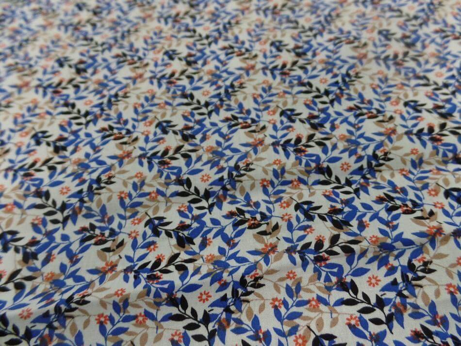 Coton popeline blanche imprimé liberty fleurs bleu et noir
