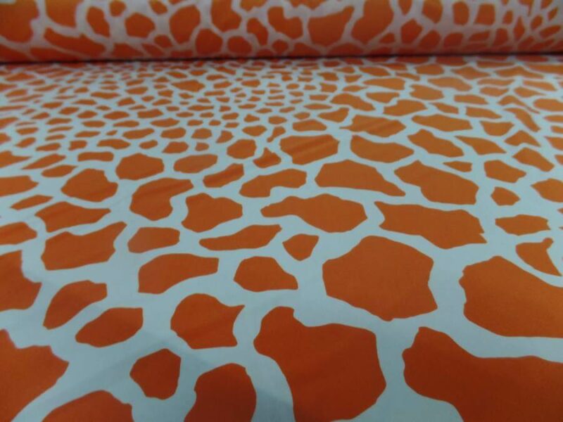 lycra double face imprime girafe ton orange et blanc9 5 m de lycra double face imprimé girafe