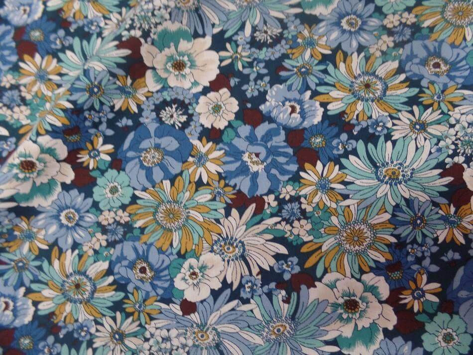 Popeline coton 100% imprimé fleurs ton bleu