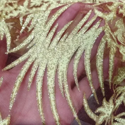 Résille non extensible fuchsia dévoré à motifs lurex doré