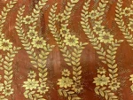 tissu Résille rouge dentelle dévorée lurex doré