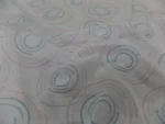 tissu Voile aspect coton blanc imprimé cercles abstraits bleu rose et saumon