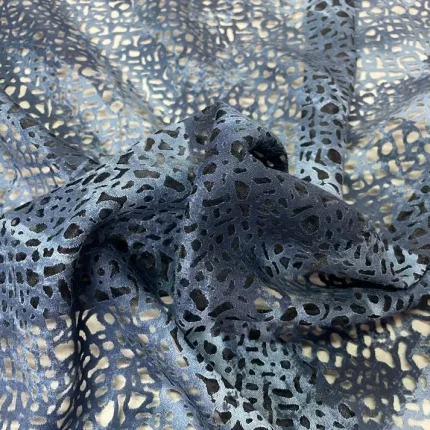 Tissu Voilage dévoré faux uni bleu en 3 m de large