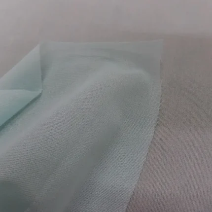 Toile collante bleue fine extensible dans la largeur