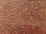 Jacquard Coton Rouille – Motif Feuillage Tissé