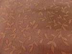 Jacquard Coton Rouille – Motif Feuillage Tissé