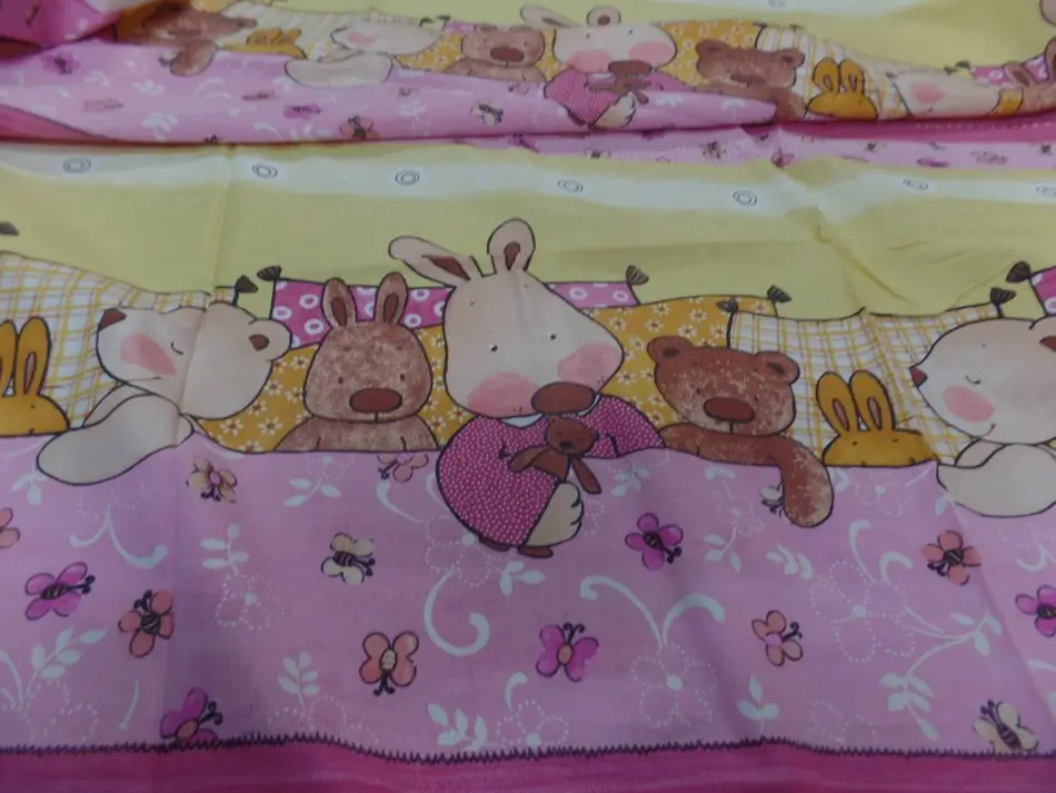 Coupon de coton rose-jaune motif dormeur