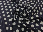 Polyester bleu nuit à pois blancs