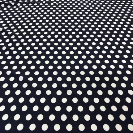 Polyester bleu nuit à pois blancs